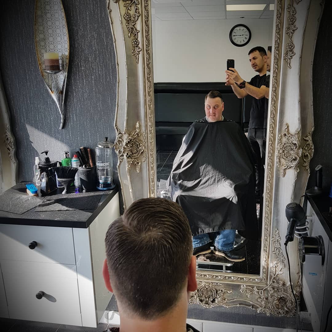 A fresh cut checked over in the mirror
